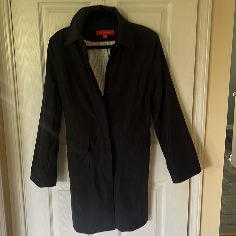 Great fall black Ann Klein coat, collar/pockets,white pokadot lining. Med